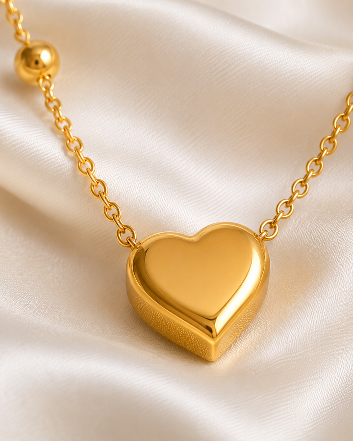 puffy gold heart pendant