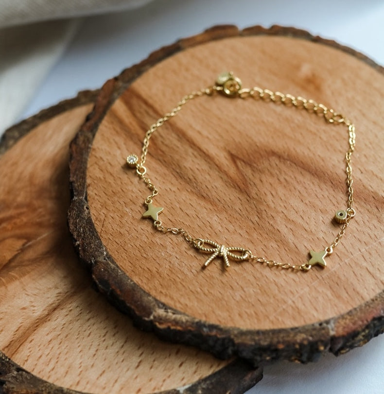 gold bow bracelet