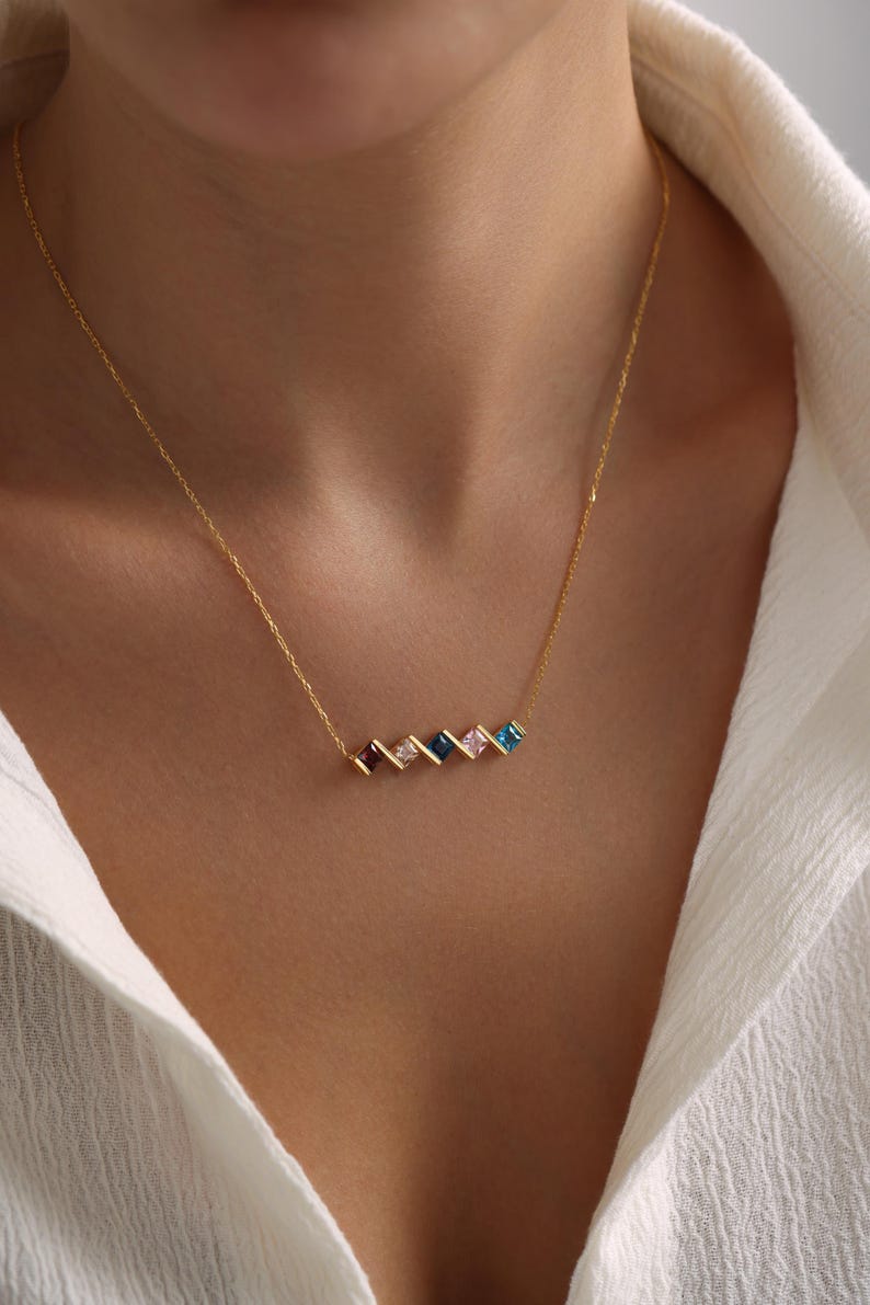 gold necklace with stone work