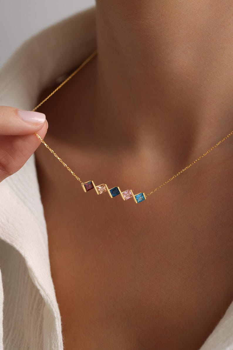 simple golden chain with colorful stones
