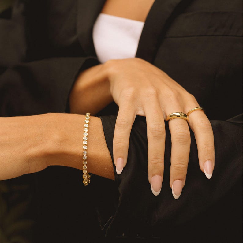 gold bracelet with stone