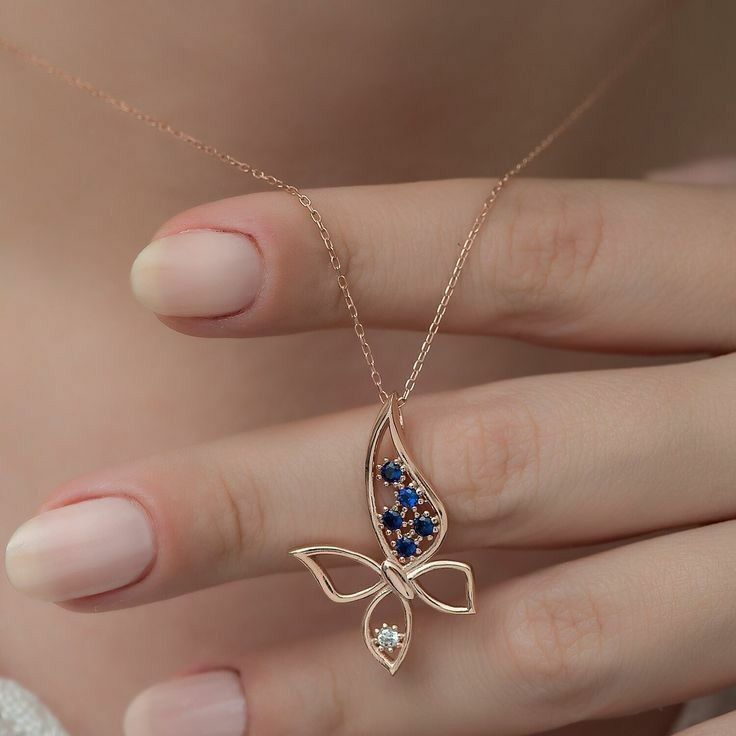 gold chain with butterfly pendant