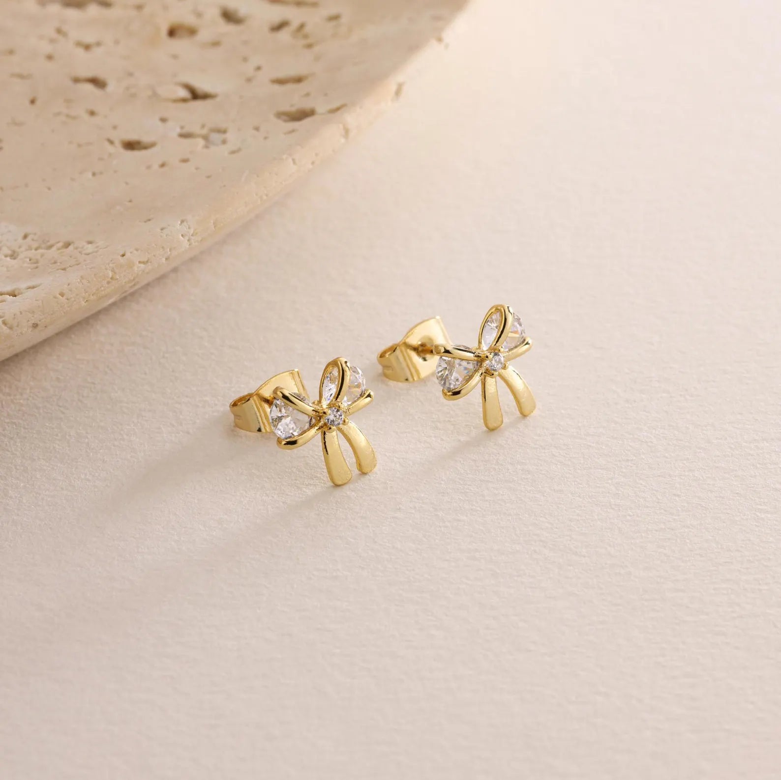 Orope’s Sparkling Bow Earrings made with 925 Pure Sterling Silver