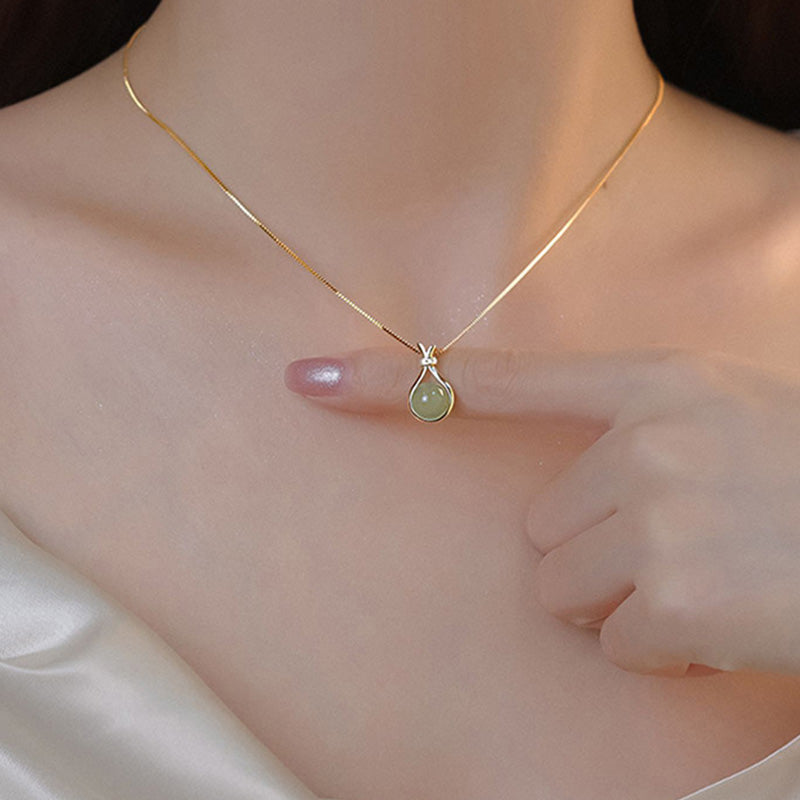 green pendant necklace