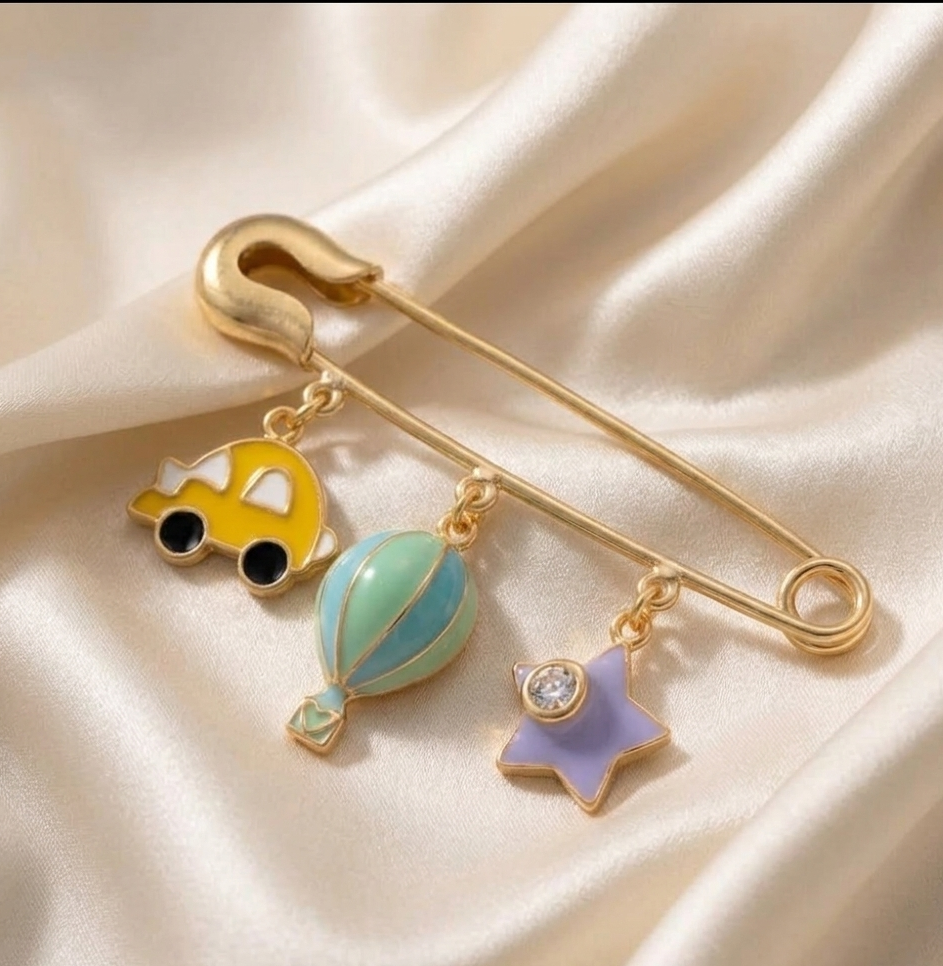 silver baby brooch
