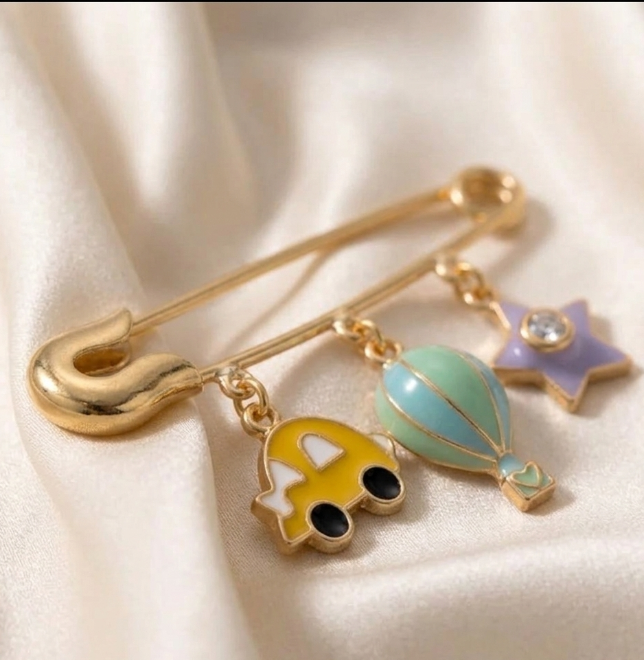 silver baby brooch